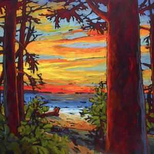 Large expressive coastal landscape of sunset over the water through the framed by backlit trees.