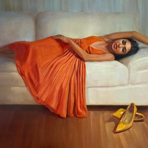 Painting of a woman in orange dress reclined on a sofa