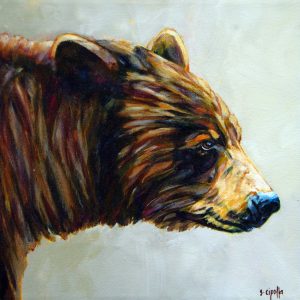 Small painting with a profile of a bear, painted brown on light background