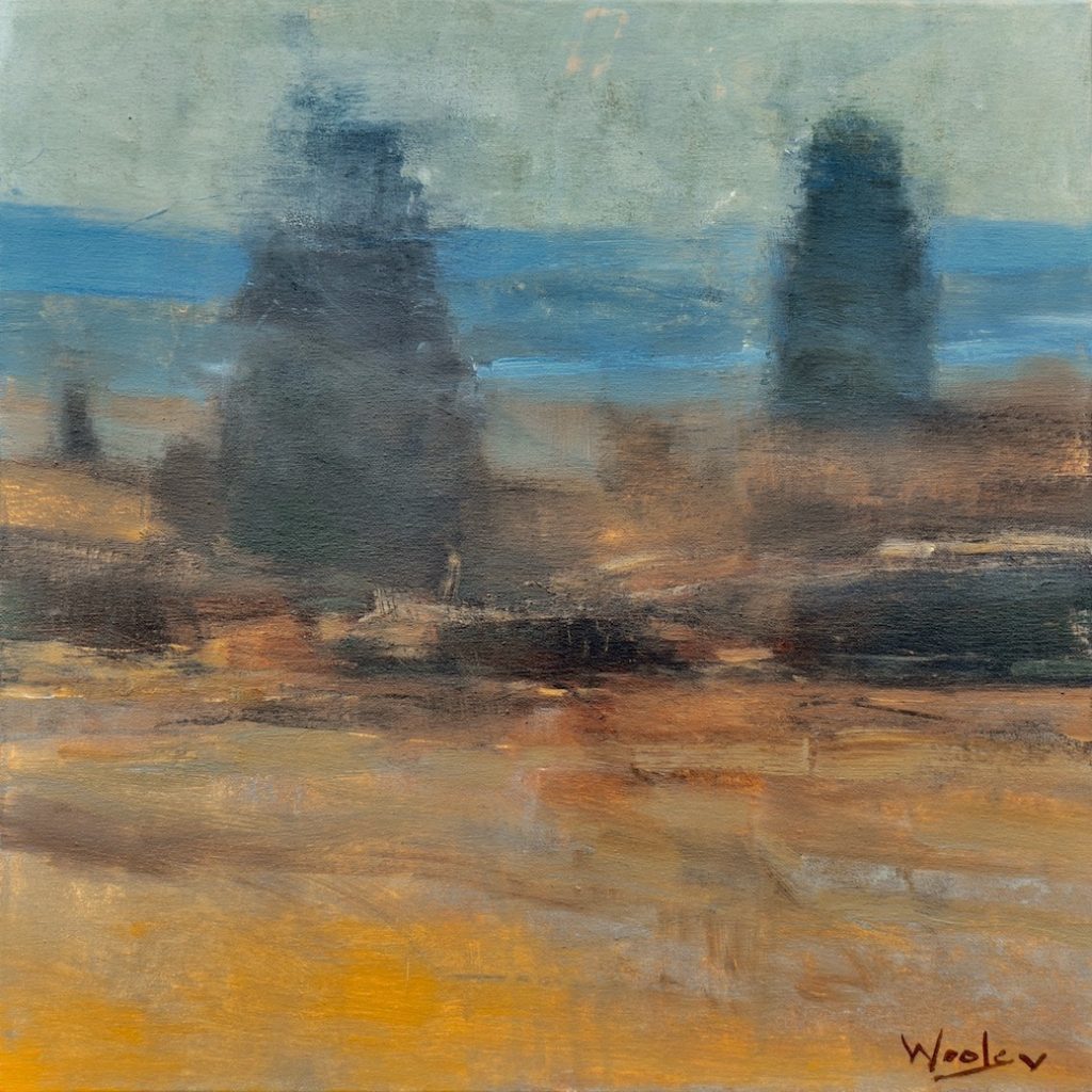 Landscape in soft golden palette with cypress trees