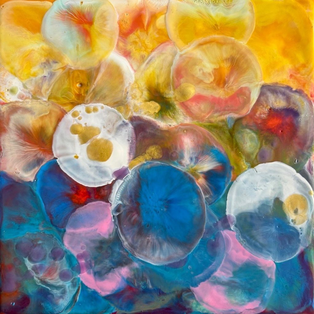 Colourful encaustic square paintingn no. 4 of abstracted jellyfish in yellow, orange, blue and green,